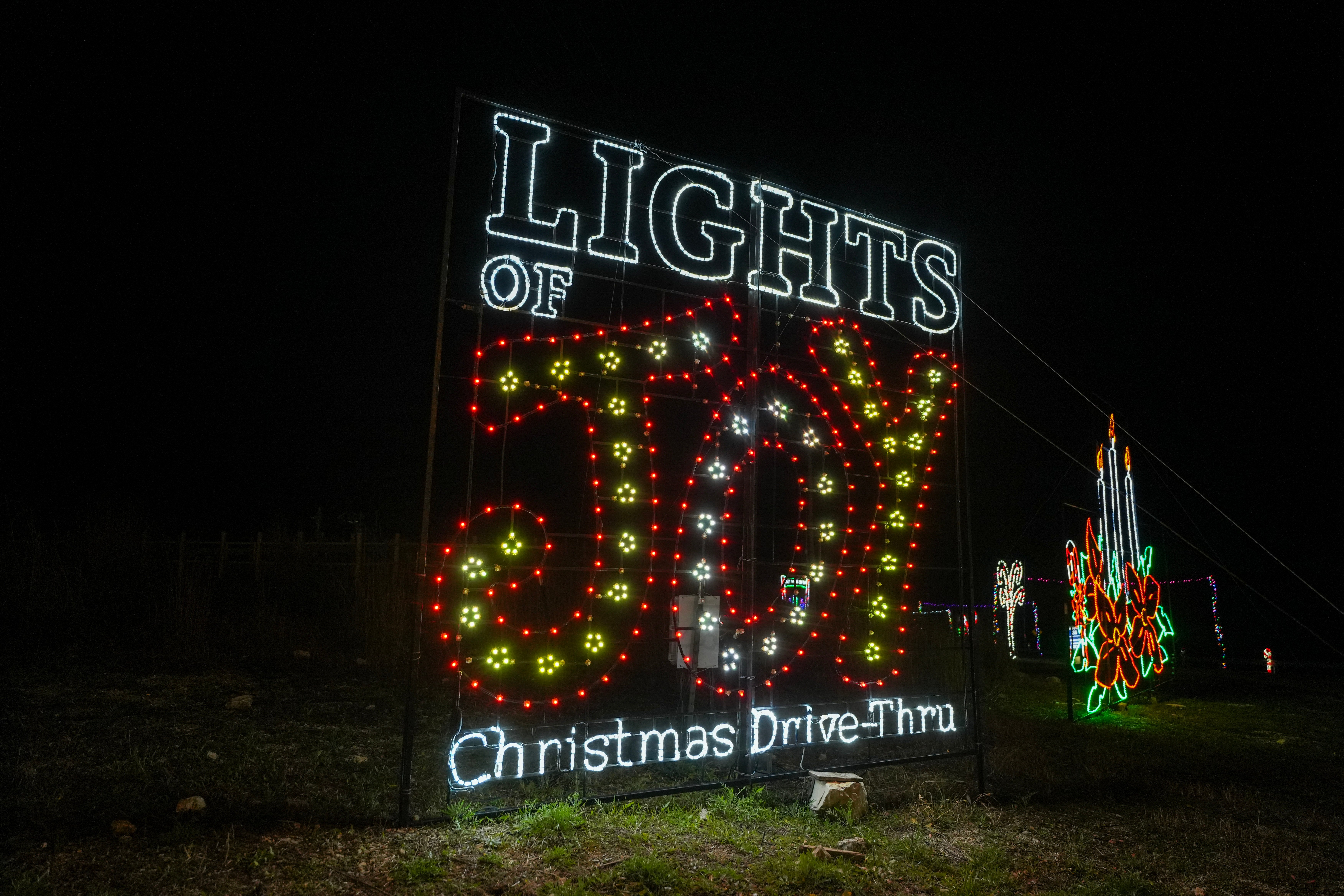 Lights of Joy name display in lights at the Christmas drive-thru in Branson